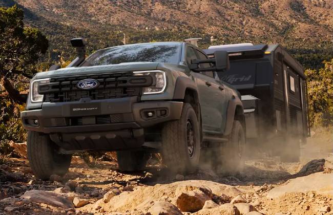 Ford Ranger Super Duty towing uphill in rugged terrain