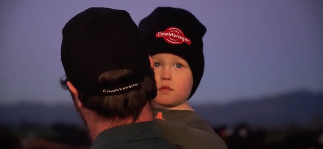 Cow Manager NZ farmer customer with child