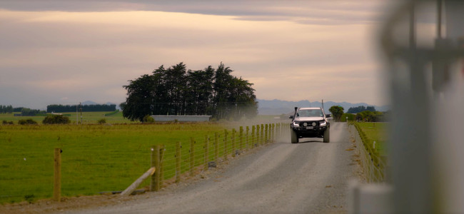 Cow Manager NZ ute driving on gravel road